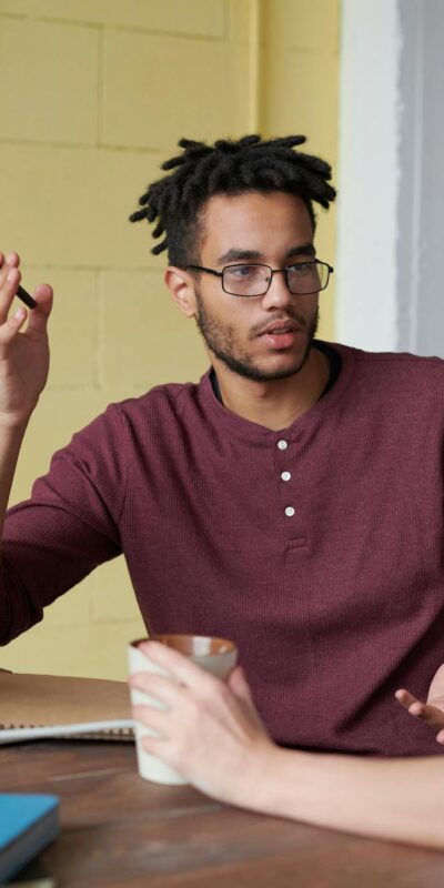 Photo Of Man Holding Pen